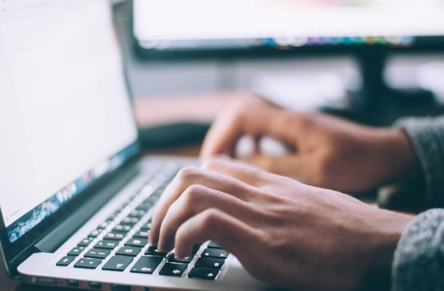 Person performing a technical SEO audit on a laptop